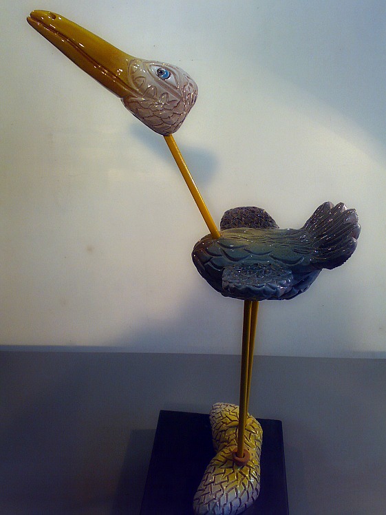 Cigüeña de cerámica y metal