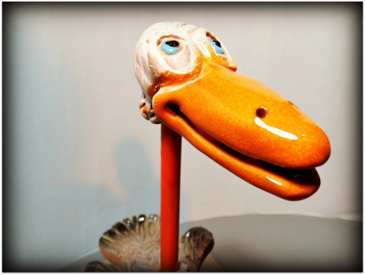 Pájaro de cerámica y metal