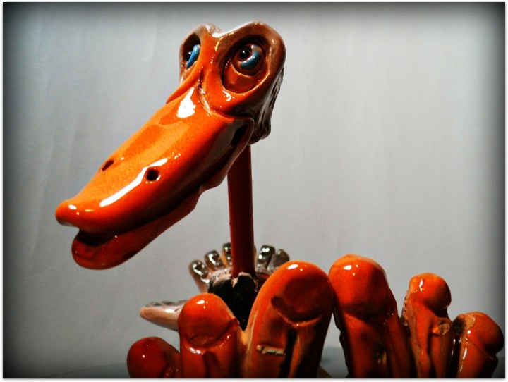 Pájaro de cerámica y metal