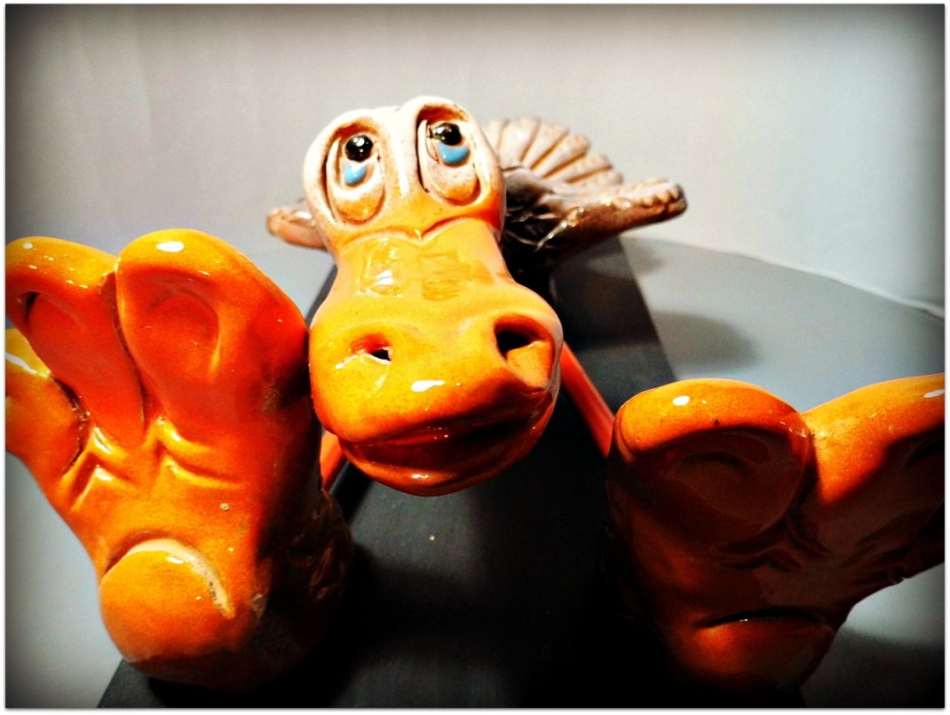 Pájaro de cerámica y metal